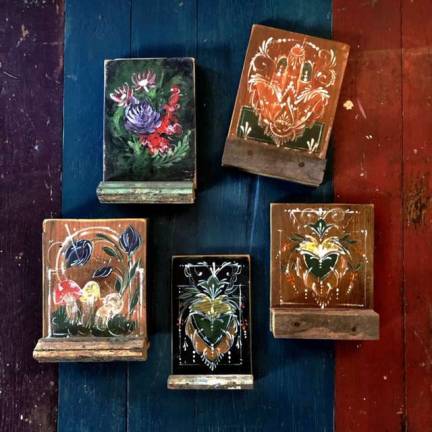Provided photos Warwickartist Deb Zimmerman repurposes found objects into functional art through reconstruction and painting.