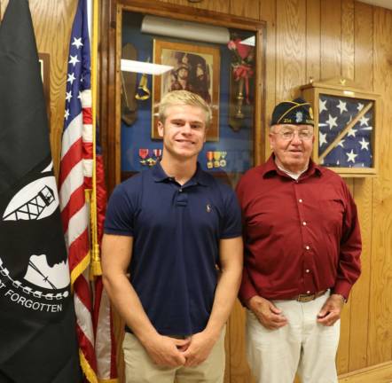 Photo by Roger Gavan Warwick Valley High School senior Noah Daigle poses with his Boys Town sponsorship coordinator Jim Dooley, first vice commander of Warwick's American Legion Post 214.