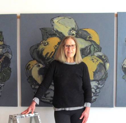 Freya Carlbom poses in front of her art.