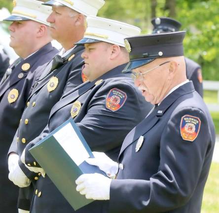 During that ceremony, Air Force veteran Barry O’Neil, who also serves as a chaplain during many Fire Department ceremonies, read the names of the volunteer firefighters from Warwick who had lost their lives during military service while fighting for the country.