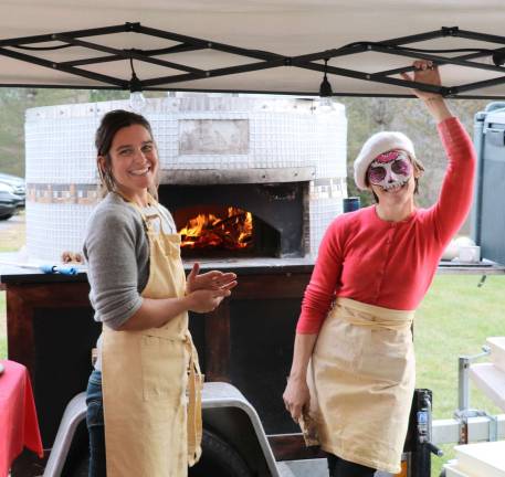 A popular attractions was wood-fired pizza topped with locally grown ingredients from Emily&#x2019;s Hearth.