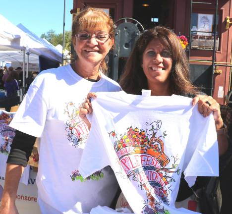 From left, Warwick Valley Chamber of Commerce Board Members Mary McClurg and Kim Corkum were on hand to sell T-shirts.