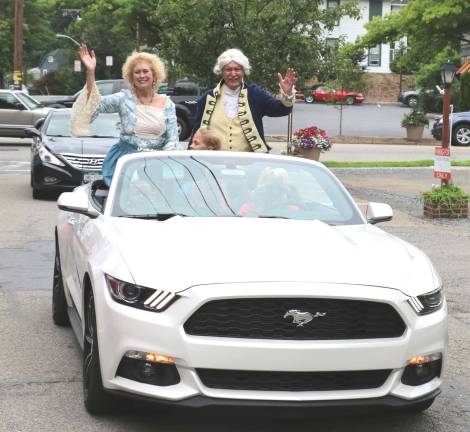 Visitors also enjoyed a surprise visit by George and Martha Washington, as played by Tom Brennan and Linda Blake. The distinguished visitors first toured the Village of Warwick in a Mustang convertible provided by Leo Kaytes Ford.