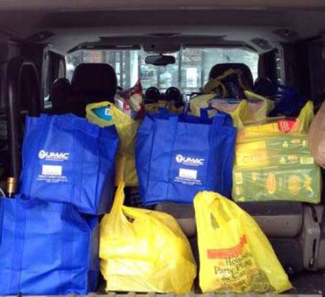 Martial arts school and local businesses raise $1,240 for food pantry