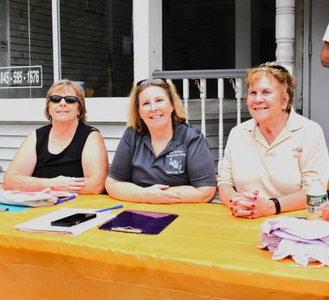 Judges for the race, from left, are Denise Spalthoof, Deirdre Spalthoof and Sally Jo Warnock.