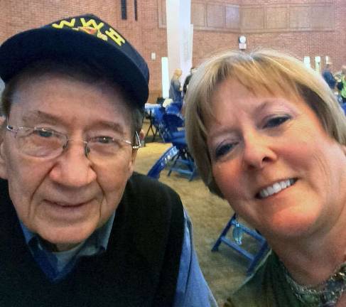 Photo provided by Joam Rueckert World War II veteran Walter McNulty is pictured here with Joan Rueckert, a history teacher at the Warwick Valley Middle School. She is a volunteer with the Hudson Valley Honor Flight, which is where she initially met McNulty. One of Rueckert's students, Emily Truncali, is advocating on McNulty's behalf to receive the Purple Heart for his service during World War II.