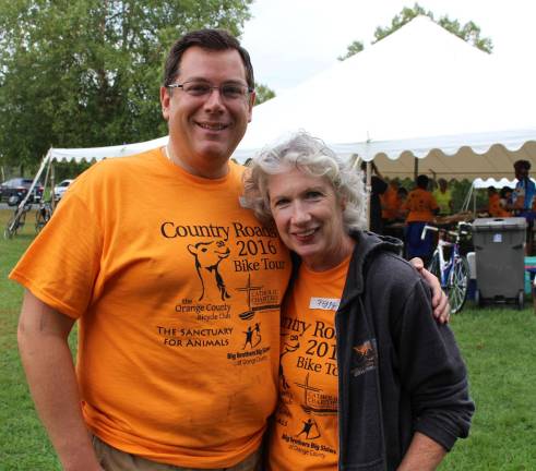 Photo provided Monroe resident and Orange County Bicycle Club President Bill Stelz and Peggy Cullen of Goshen, OCBC Country Roads coordinator, finalize plans for the Sept. 17 event.