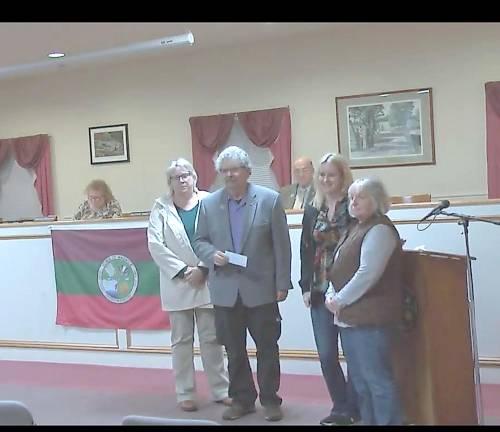 Back row, left to right: Pine Island Recreation Committee members Nancy Scheinert, Susan McCosker and Paulette Wilk Rudy stand with, front, Councilman Russell Kowal.