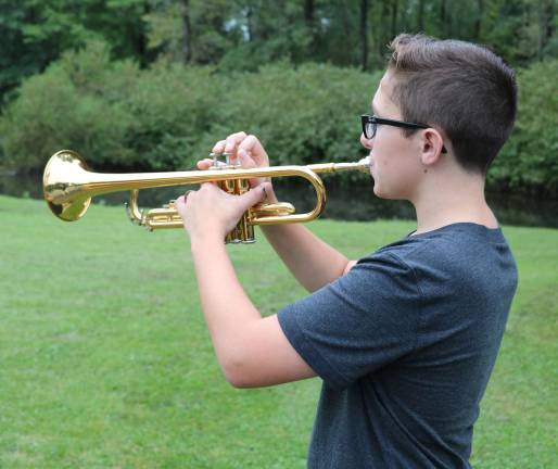 The ceremony concluded with playing &quot;Taps&quot; by Aiden Rosen, a member of the Warwick Valley High School Band's Wind Ensemble, a benediction and the song, &quot;God Bless America.&quot;
