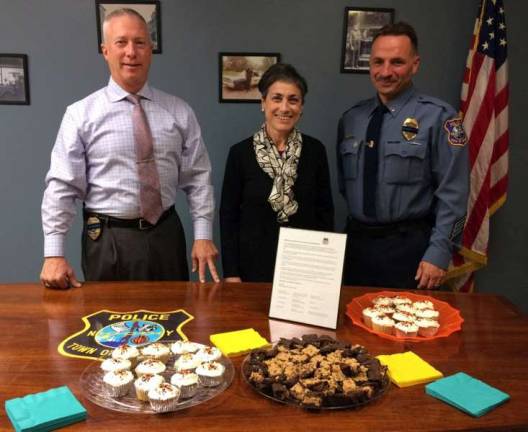 On behalf of the Warwick Applefest Committee, a thank you letter and desserts were delivered to the Warwick Police Department to show the Committee&#x2019;s appreciation for the Department&#x2019;s assistance and support. From left - Chief of Police, Thomas McGovern; Applefest Committee member, Louise Hutchison; and Lt. John Rader, the WPD liaison on the Applefest Committee.
