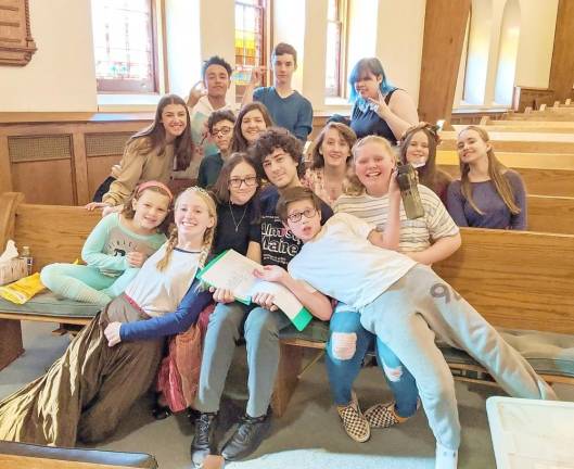 Players in the Warwick Reformed Church Theatre Company take a break from rehearsing for their free performance of Disney's Frozen Jr., scheduled for Friday, Dec. 6.