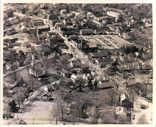 Photo provided by Warwick Village Historian Jean B. May Pictured here is an aerial view of the north end of Main Street, circa late 1950&#x2019;s or early 1960&#x2019;s before the new post office was begun. Lewis Park was just being built at the corner of Main and High Street. Across the street is Drew&#x2019;s Garage, now Dunkin' Donuts. Another Wheeler house on the corner had not yet been razed.