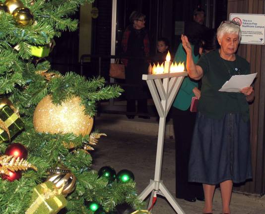 An invocation and blessing of the tree by Chaplain Sister Mary Spano.