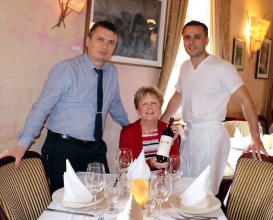 Photo by Roger Gavan The Backpack Snack Attack Program will hold a Fall Fling dinner/fundraiser at Grappa Ristorante on Monday, Nov. 6. Backpack Snack Attack Program Director Shirley Puett helped plan the event with Grappa Ristorante business partner Nick Ahmetaj (left) and owner Tony Sylaj.