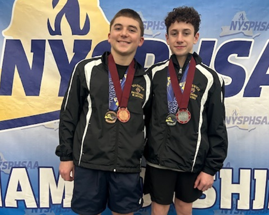 Left to right: Freshmen Drew Voloshin and Mac Tomlinson finish second and seventh, respectively at meet.