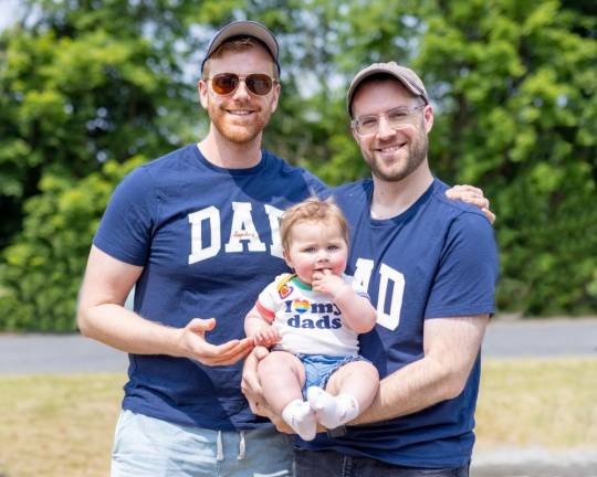 Mary Alice Muhller, 1, of Warwick and her dads, Chris and Bobby, at the Warwick NY Pride and Parade.