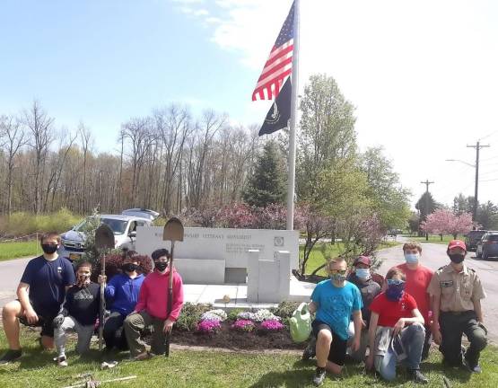 And this is what the entrance to the park looked like when the scouts had completed their latest conservation project for the American Legion. From left, Boy Scouts of America Troop 45 scouts Sebastian Brand, Evan Gomez, Holden Frommeyer, Logan Fanizza, Sean Klein, Eugene Cummings, Tommy Maiorana, Logan Jakubek, and Jackson Frommeyer. Photo by Roger Gavan.
