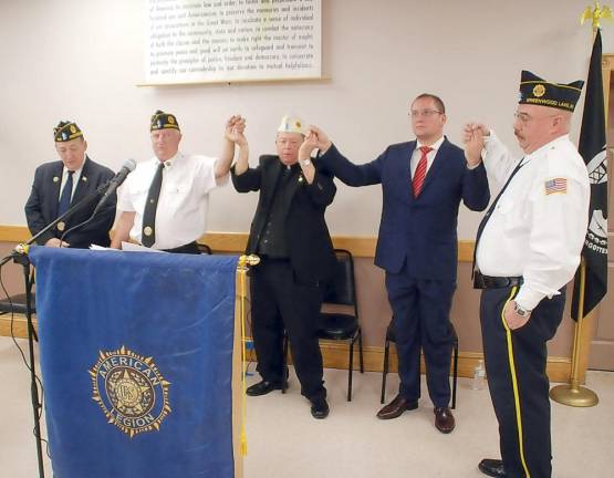 Vet service closed with the singing of God Bless America. Singing left to right are: Warwick Town Council Floyd DeAngelo, Legion CommanderTom Mulcahy, Legion Chaplain Father Robert Sweeney, GWL Mayor Jesse Dwyer and Program Master of Ceremonies Walter Kittle.