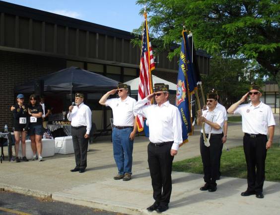 As part of the ceremonies, Carmine Garritano (far left) sang the National Anthem with the Warwick Valley VFW Post 4662 color guard.