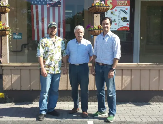Arnold Bieling (center) with sons Tim and Scott.