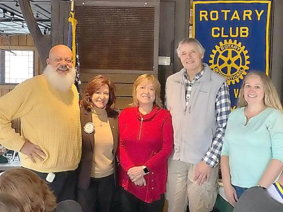 The Warwick Valley Rotary shared winter coats with leaders of the Warwick Area Migrant Committee at the last meeting of the year. From the left, Rotarians Wayne Patterson, President Tina Buck, Katherine Brieger and Joseph Maggio of the Migrant Committee, and Rotarian Laura Barca.