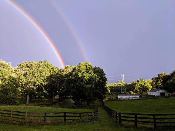 Mandes Kates took these photos early Thursday evening from his backyard on Four Corners Road in Warwick.