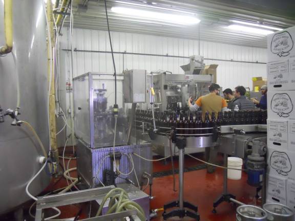 Photo by Alexis Tarrazi Doc's Draft being bottled.