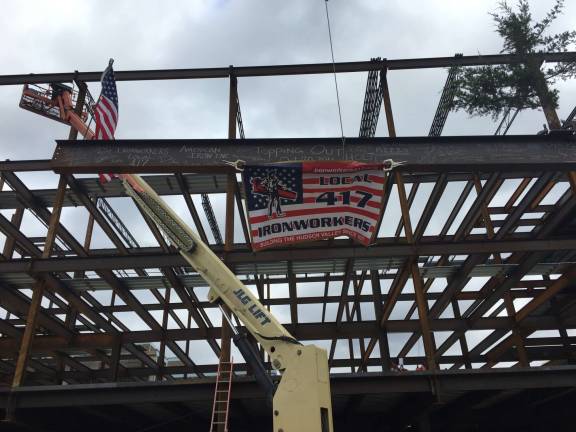The steel beam with signatures (Photo provided)