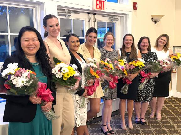 From left to right: President Susie C. Sohn, President-Elect Colleen Decker, Vice President Yvette Rosario, Treasurer Lara Morrison, Recording Secretary Isabelle Hayes, Corresponding Secretary Amy Davidoff, WBASNY Delegate Sherry Kwo, and Immediate Past President Amanda Sevier.