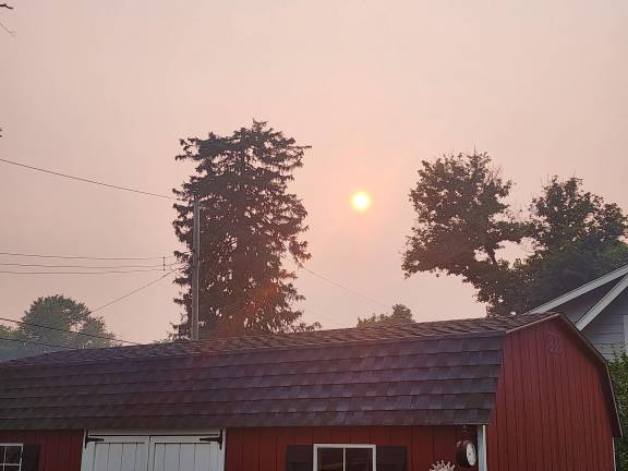 A smoky pink sky in Edenville Thursday evening. Photo: Brian Dunn