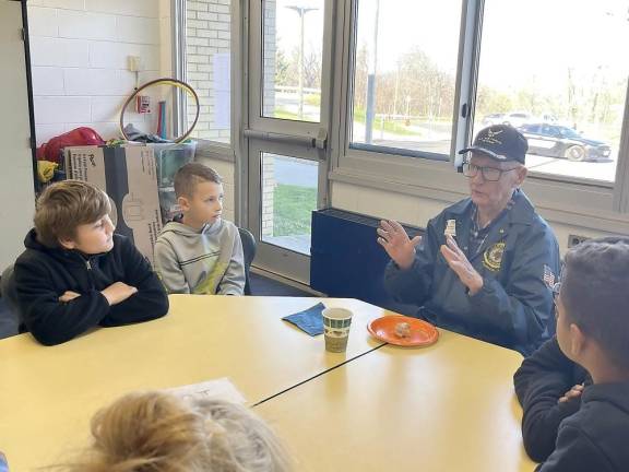 Veterans commune with Gold Hill Elementary kids at a breakfast
