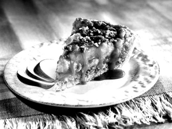 Photo courtesy American Pie Council Linda Hundt of DeWitt, Mich. won the 2011 American Pie Council Crisco National Pie Championships for her sticky toffee pudding apple pie.