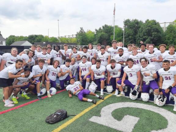 Warwick Football Team following their victory at Alumni Stadium in Binghamton, New York,of Section IV (Southern Tier)