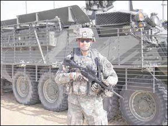 Iraq war hero and other vets join school's end-of-year picnic