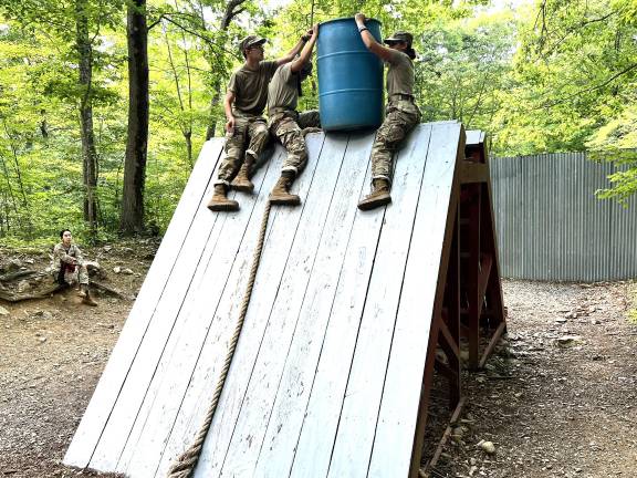 S.S. Seward cadets in the JROTC’s Cadet Leadership Challenge summer camp complete a challenge they were tasked with.