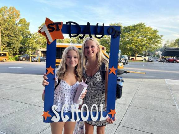 Dani D. and Lauren S. ready for the first day of eighth grade.