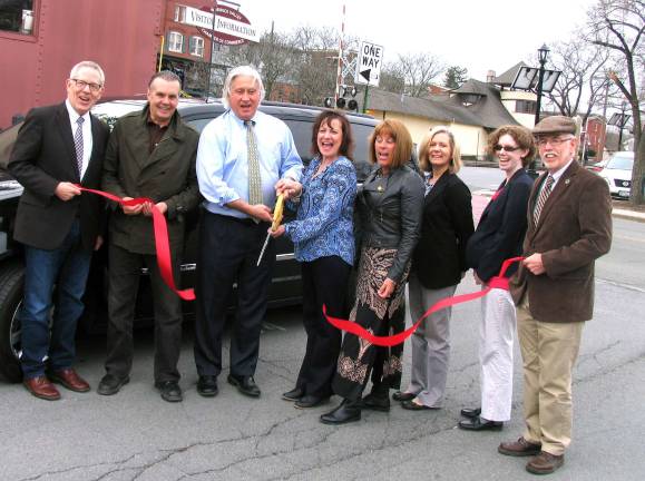 Photo by Roger Gavan On Wednesday, March 23, Town of Warwick Supervisor Michael Sweeton and members of the Warwick Valley Chamber of Commerce joined owners Michael and Linda Punch and their public relations consultant Peter Hall to celebrate the success of Warwick Valley Car Service with a ribbon cutting ceremony. From left, Chamber Executive Director Michael Johndrow, public relations consultant Peter Hall, owners Michael and Linda Punch, Chamber President Mechelle Casciotta, board members Kim Starks and Elizabeth Cassidy and Town of Warwick Supervisor Michael Sweeton.