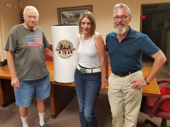 Photo by Jennifer O'Connor The 2017 Time Capsule, which was made possible by funds donated from the Warwick Valley Rotary Club, will be buried on Saturday, Oct. 14, in Veterans Memorial Park. Pictured from left to right are Time Capsule Committee Chairman George Arnott, Sesquicentennial Events Coordinator Mary Collura and Village of Warwick Mayor Michael Newhard.