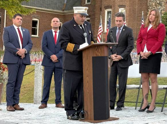 Captain Rich Gogan, a fireman who responded on Sept. 11, 2001, speaks in Florida, N.Y. during an area memorial service.