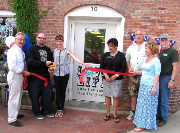From left, Warwick Mayor Michael Newhard, partners Matt Leahy and Kimberly Simpson, Warwick Valley Chamber of Commerce President Sherry Bukovcan, Leahy&#xed;s stepfather and mother, George and Laura Laplace and Town of Warwick Supervisor Michael Sweeton.