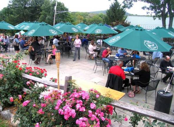 Photos by Roger Gavan Approximately 210 tickets were sold and guests had a choice of outdoor seating on a 4000 square-foot patio or mingling with friends in the huge tent while sampling gourmet dishes and wine.