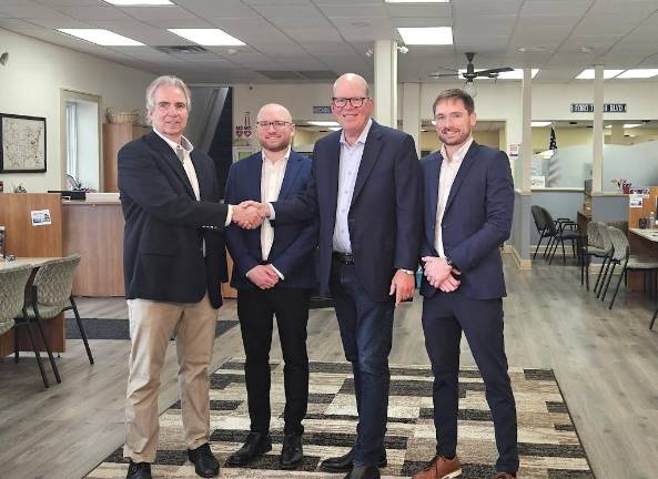 Leo Kaytes, Jr., welcomes the Fette family to Warwick. L-R: Leo Kaytes, Jr., Hart Fette, John Fette and Daniel Fette.