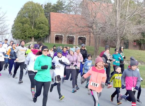 On Sunday, Nov. 10, a crowd of well over 100 participants braved unseasonable cold weather to complete 5K and 1K events in Wickham Woodlands Park.