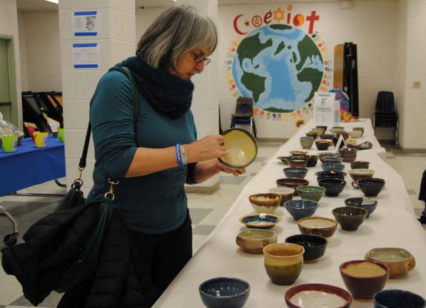 At Empty Bowls, beautiful handmade pottery bowls, made and donated by local potters, are available for purchase.