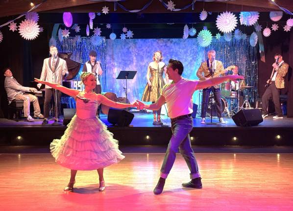 Dancers from Core Theatre Group with The Cicadas’ 57 band.