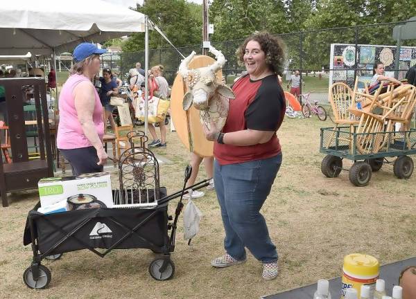 One lucky shopper scored a hand-embroidered fabric deer head sculpture, wire wine rack, and a three-crock slow cooker.
