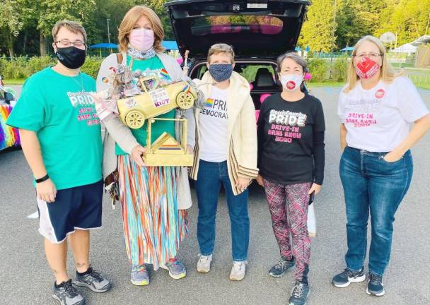 From left: Sean Dorsa (Edge Pride); Simone Kraus, holding the prize for the best-decorated car; lead organizer Cara Parmigiani of the TriVersity Center for Gender and Sexual Diversity, based in Milford, Pa.; and Fern Wolkin and Theresa Pil of Mother’s Demand Action (Photo provided by Simone Kraus)