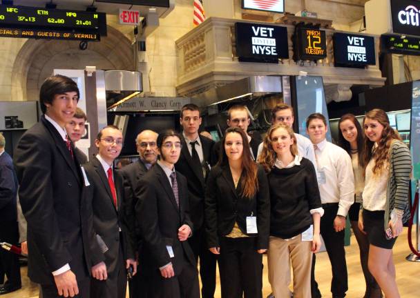 Students from Warwick Valley High School&#xfe;&#xc4;&#xf4;s Investment Club recently had the rare opportunity to travel to Wall Street in New York City to visit the New York Stock Exchange. Pictured from left to right are: Nick Lohle, Brandon Fisher, J.R. Caiafa, Mr. Emmanuel Riser, Ben Riser, Gerard Nicoletti, Dan Walsh, Cassie Pacelli, Rachel Janes, Liam Hayes, Ronnie Broere, Norwegian exchange student Regine Markussen and Katie Mandracchia.