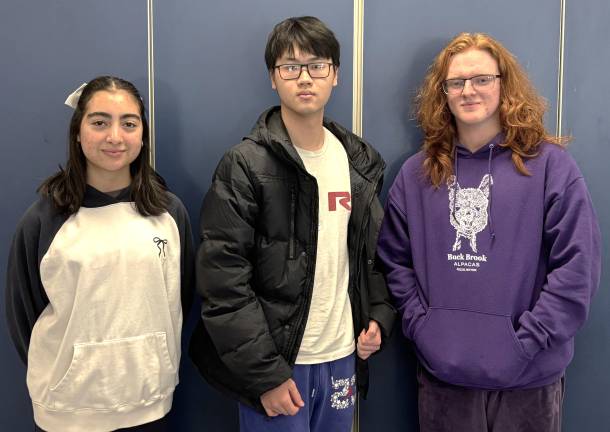 High School Art/Music Students of the Month Carla Zuluaga, Felix You, and David Burkey.