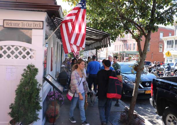 The crowds spilled over to visit Main Street businesses.